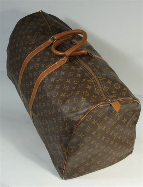 louis vuitton orange duffel bag|louis vuitton duffle bag vintage.